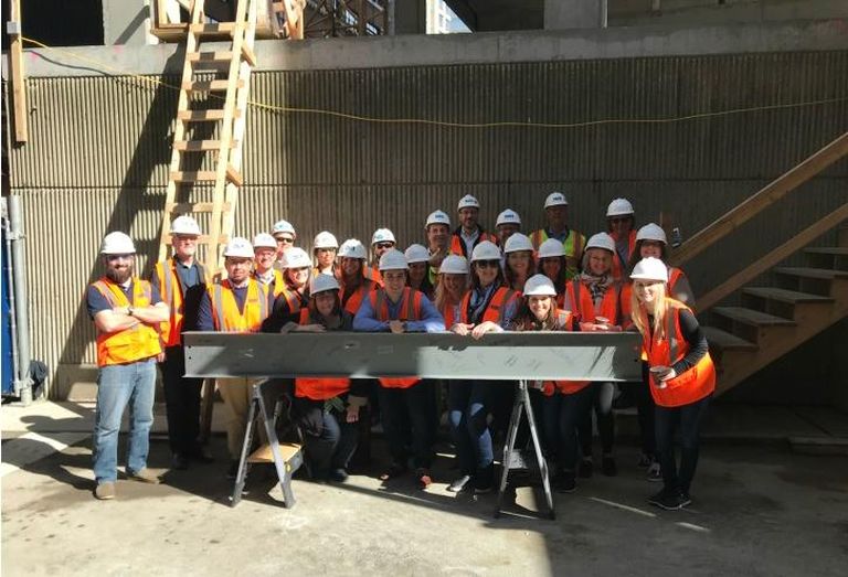 Belgravia Group recently celebrated the topping-off of its 18-story Renelle on the River luxury condominium building with a beam-signing ceremony on site at 403 North Wabash in River North.