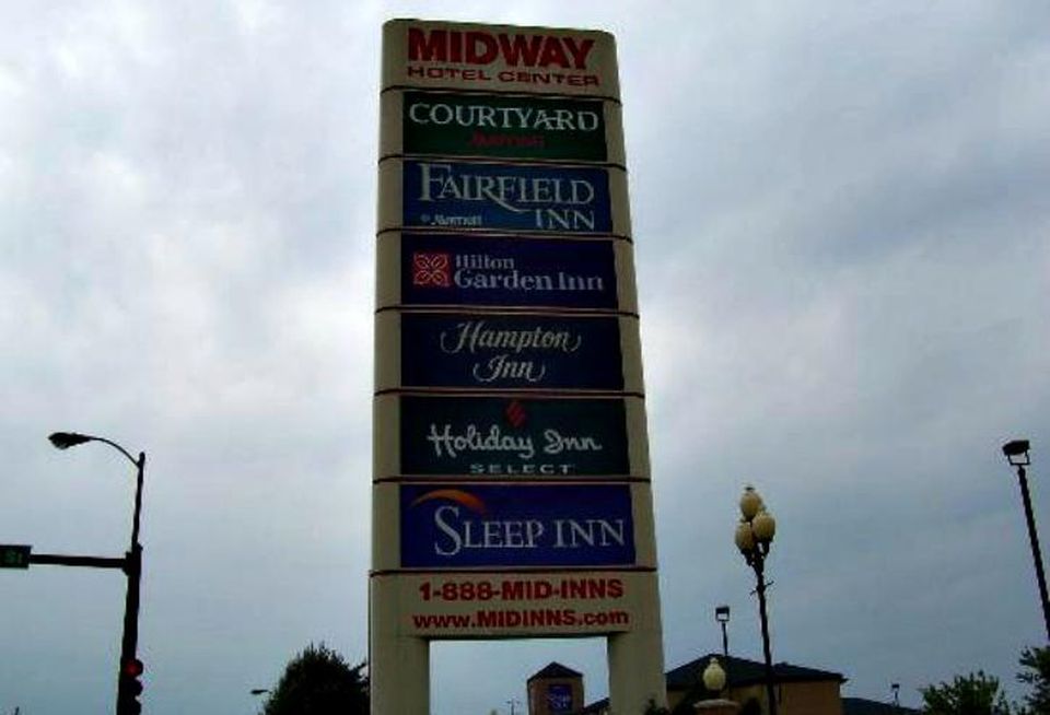 A sign listing the hotels at Midway Hotel Complex, Chicago