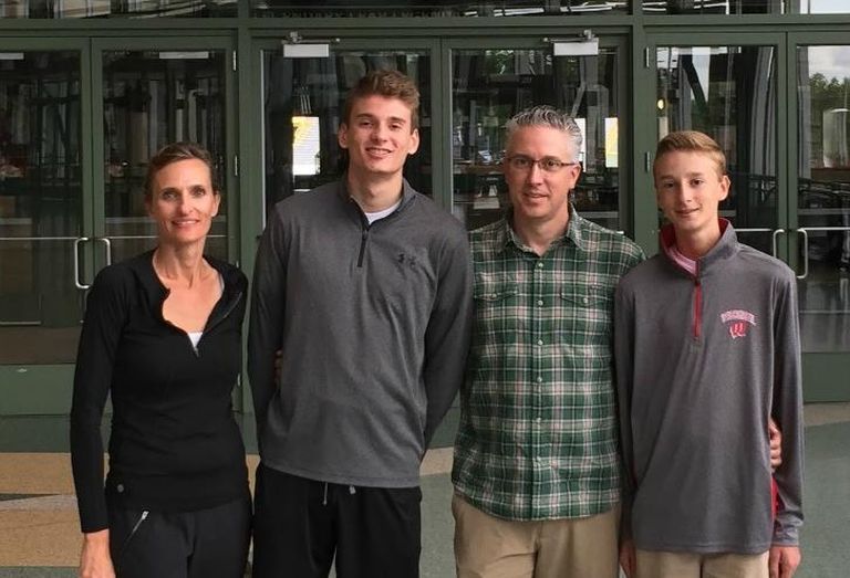 Avison Young Chief Financial Officer Christine Battist with son Alex, husband Robb and son Harrison.