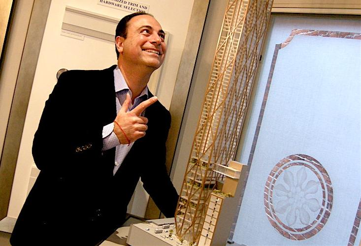 Mizrahi Developments president Sam Mizrahi, with a model of The One, an 80-storey mixed-use tower planned for 1 Bloor St. W.