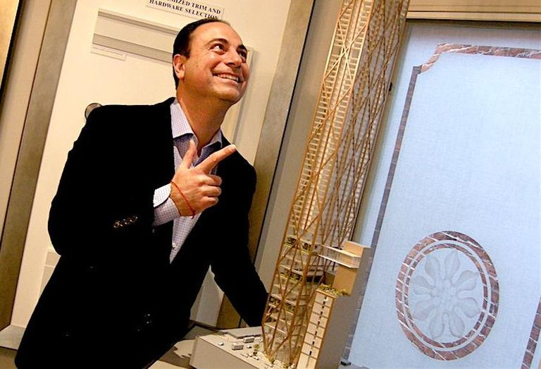 Mizrahi Developments president Sam Mizrahi, with a model of The One, an 80-storey mixed-use tower planned for 1 Bloor St. W.