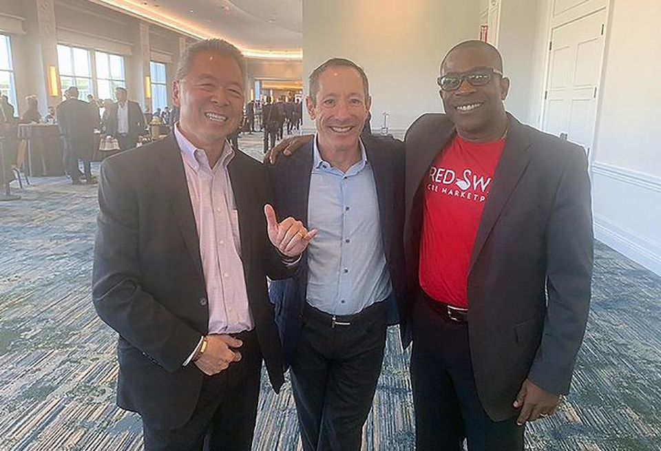 Investment brokers John Chew and Ed Rosen with RedSwan CEO Ed Nwokedi.
