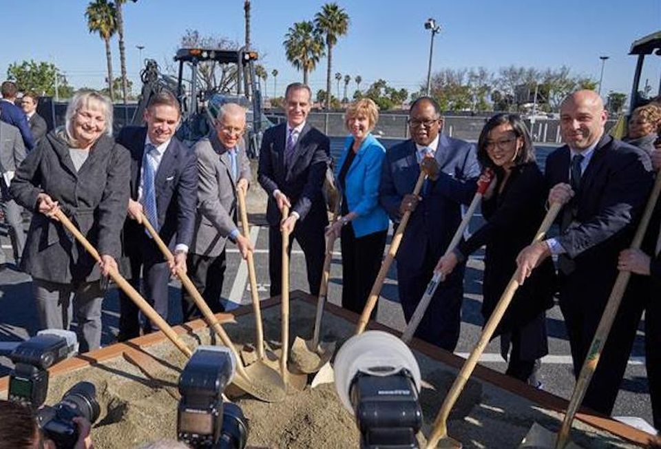 Los Angeles Mayor Eric Garcetti (center), along with other city officials break ground on LAX's Automated People Mover