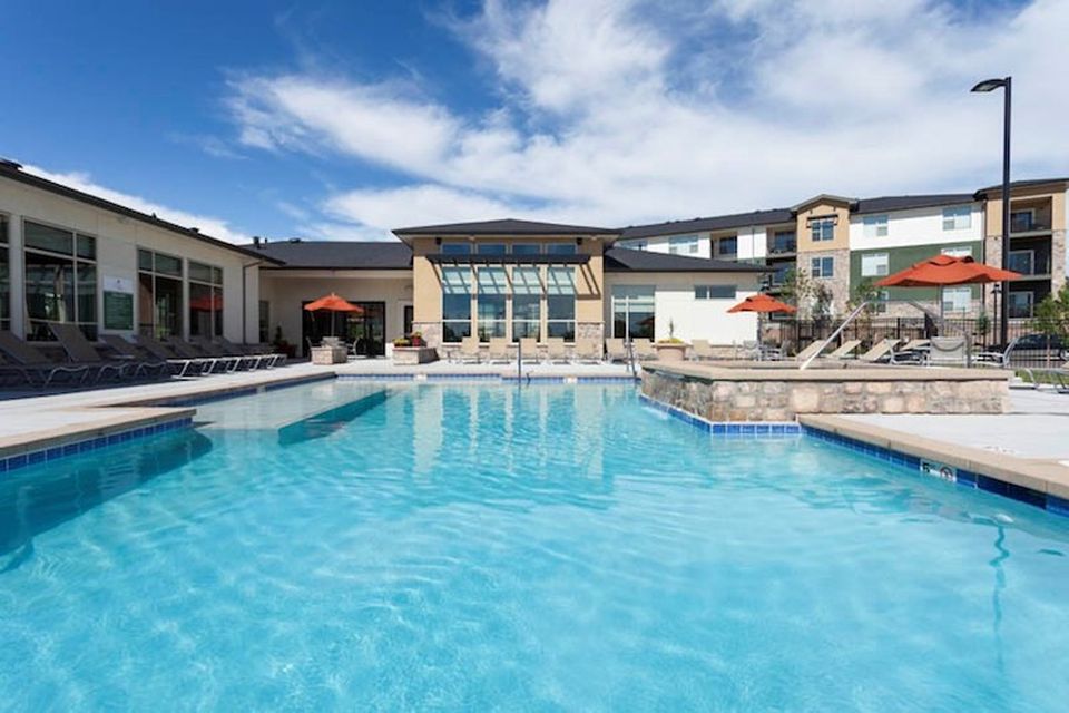 Arterra Place amenities include a heated swimming pool and outdoor fireplaces.