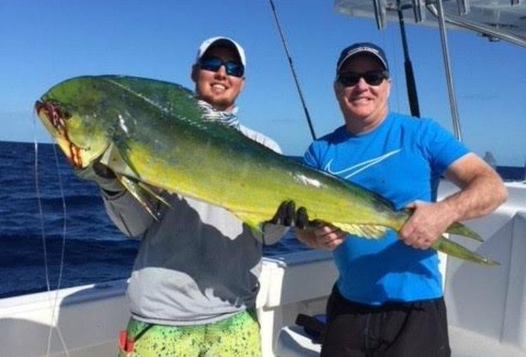 Tim Downey, Southern Land Co holding a fish