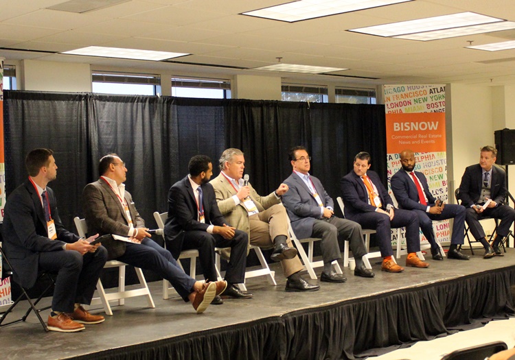 Jackson EMC Business Development Manager Kevin Dodson, Capitol Seniors Housing Principal Michael Hartman, Gwinnett County Government Director of Economic Development Roman Dakare, Brand Properties CEO Brand Morgan, Ackerman & Co. Retail President Leo Wiener, Partnership Gwinnett Vice President of Economic Development Andrew Carnes, Gwinnett County Commissioner Kirkland Carden and Goode Van Slyke Architecture Vice President Stephen Cook at Bisnow's Gwinnett County event on Oct. 5, 2021.
