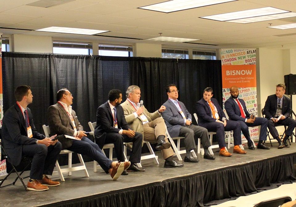 Jackson EMC Business Development Manager Kevin Dodson, Capitol Seniors Housing Principal Michael Hartman, Gwinnett County Government Director of Economic Development Roman Dakare, Brand Properties CEO Brand Morgan, Ackerman & Co. Retail President Leo Wiener, Partnership Gwinnett Vice President of Economic Development Andrew Carnes, Gwinnett County Commissioner Kirkland Carden and Goode Van Slyke Architecture Vice President Stephen Cook at Bisnow's Gwinnett County event on Oct. 5, 2021.