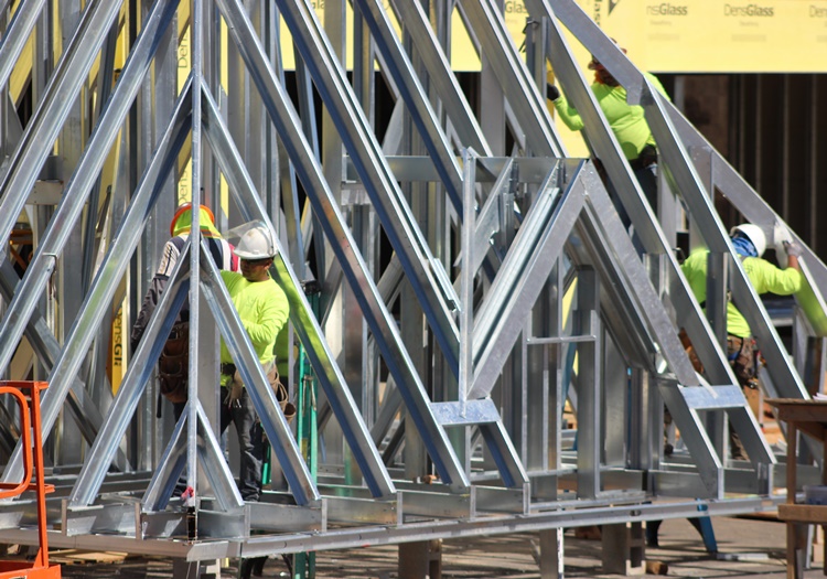Construction continues in suburban Atlanta development despite the coronavirus pandemic, March 25, 2020.