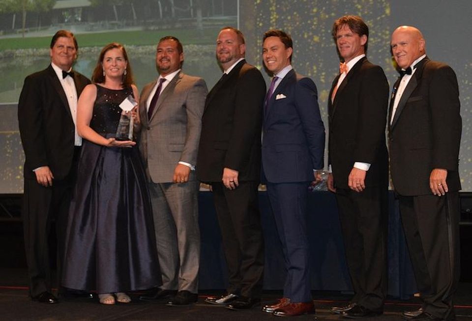 Stoneridge Corporate Plaza in Pleasanton; Capstone Property Management president Kent Gibson, BOMA International chair and BOMA Fellow (far left); The Home Depot national PRO manager Earl Madison (second from right); and Parmenter Realty Partners managing director of facilities and sustainability Steve Harrison, a BOMA Fellow and TOBY Award chair (far right) presented the award.