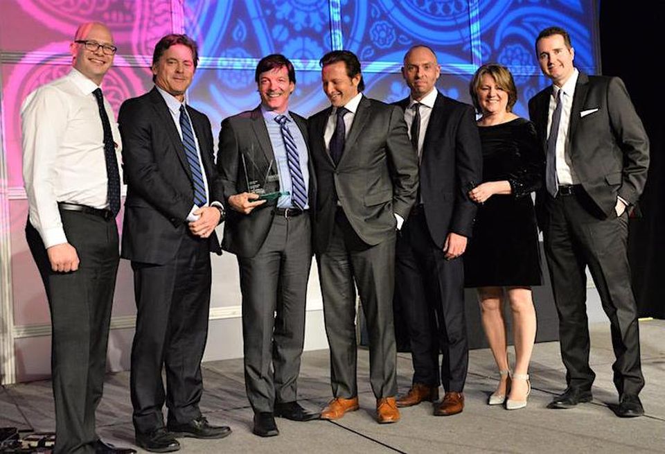 Stan Krawitz (centre) was the winner of NAIOP’s Industrial Lease of the Year for 2015.