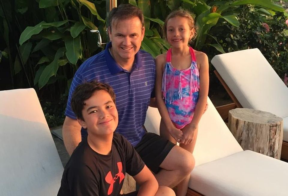 TruAmerica senior managing director Greg Campbell with son, Everett, and daughter, Cambria.