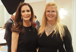 Cushman & Wakefield's Tara Stacom and her sister, CBRE's Darcy Stacom, at the 2016 REBNY gala