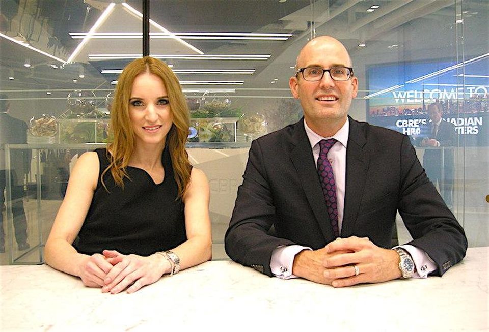 CBRE corporate strategy VP Ashley O’Neill and GTA regional managing director and EVP Werner Deitel in the boardroom of the firm’s new downtown digs, on floors 11/12 of LEED Gold 145 King W.