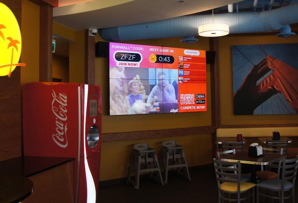 The video wall at CaliBurger's new Vancouver store.