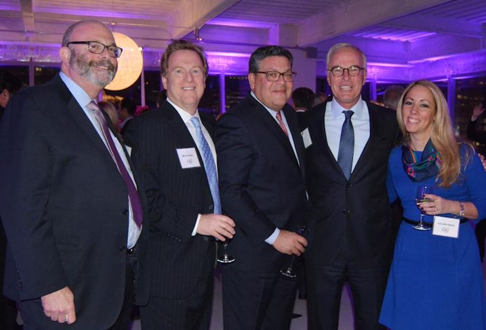 Jeffrey Gussoff, Mitch Berkey, Frank Giantomasi and Lisa John Basta with SJP chairman and CEO Steve Pozycki (second from right).