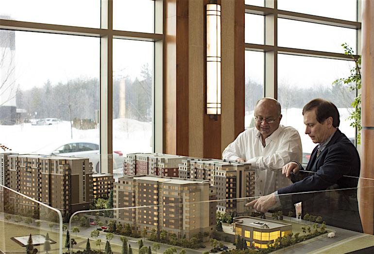 SVN Rock Advisors CEO Derek Lobo and Lépine Corp president Francis Lépine at the William's Court at Kanata Lakes presentation centre.