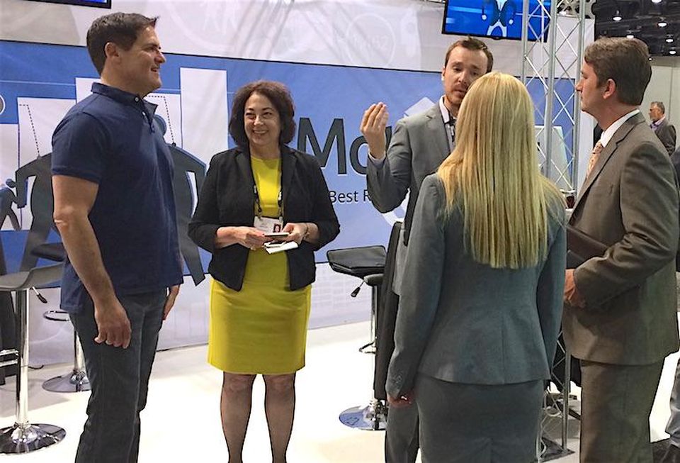 Motionloft owner Mark Cuban (left) with VP Chris Garrison (seen gesturing).