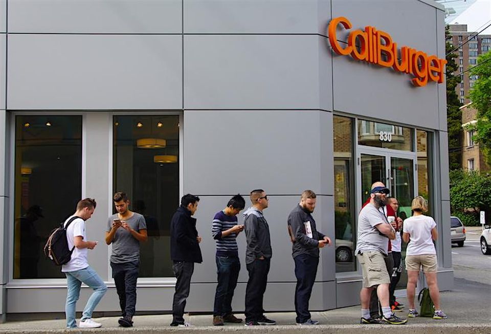 The line-up on opening day of CaliBurger's new Vancouver store.