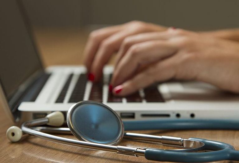 Stethoscope and Laptop Computer