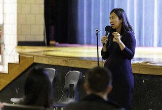 Mayor Michelle Wu speaking at a town hall meeting about Boston's property tax shift proposal.