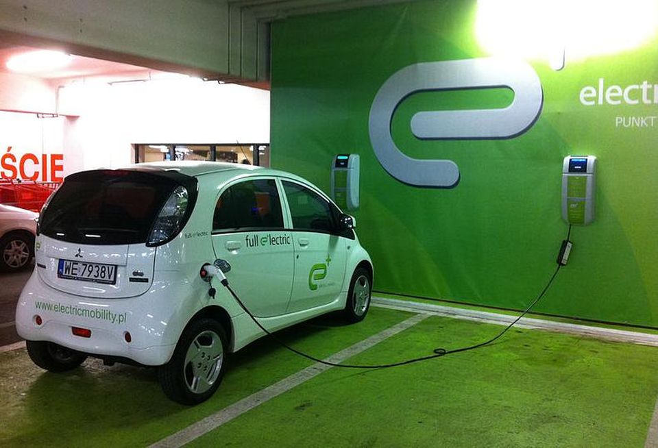 Credit: Wikimedia Commons: CZmarlin https://commons.wikimedia.org/wiki/File:Electric_automobile_recharging_at_a_Warsaw_shopping_center_garage-1.jpg