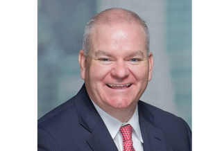 David Walsh,  executive director of JPMorgan Chase