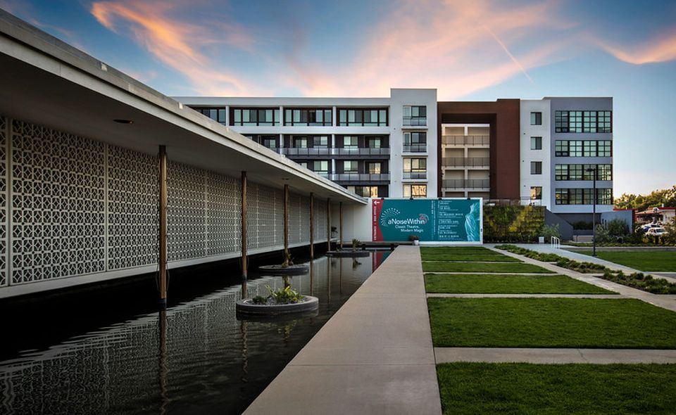 The Ellington, a multifamily development along East Foothill Blvd adjacent to the historic 1958 Stuart Pharmaceuticals Building.