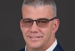 JLL public relations director Kristen Murphy emailed permission from Daniel Schneider for headshot use to Sonya Swink on 4/3.