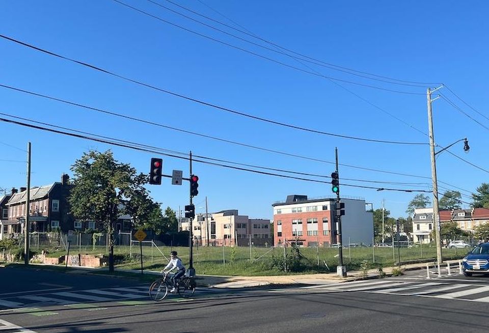 The large lot at the corner of Monroe and 9th streets NE has remained vacant as the project has been stalled for over a decade.
