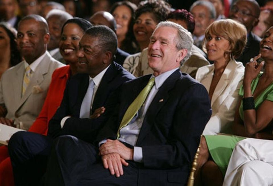 Robert Johnson with former President George Bush.