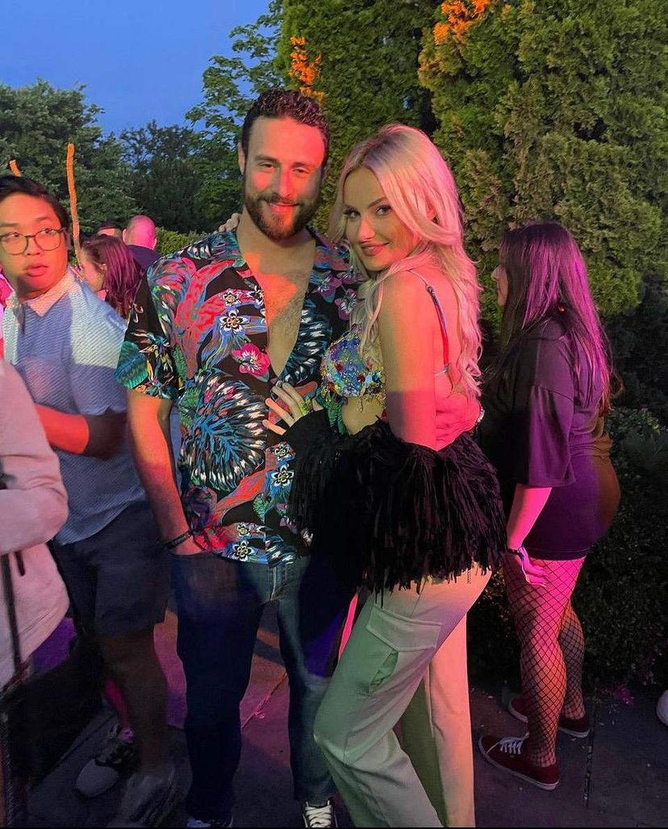 Bisnow Director Zak Guysenir out with his wife.