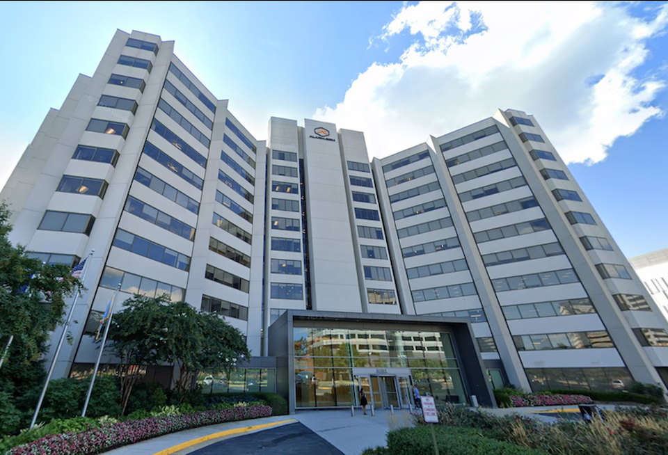 The building at 8281 Greensboro Drive in Tysons has Alarm.com's logo on its façade.