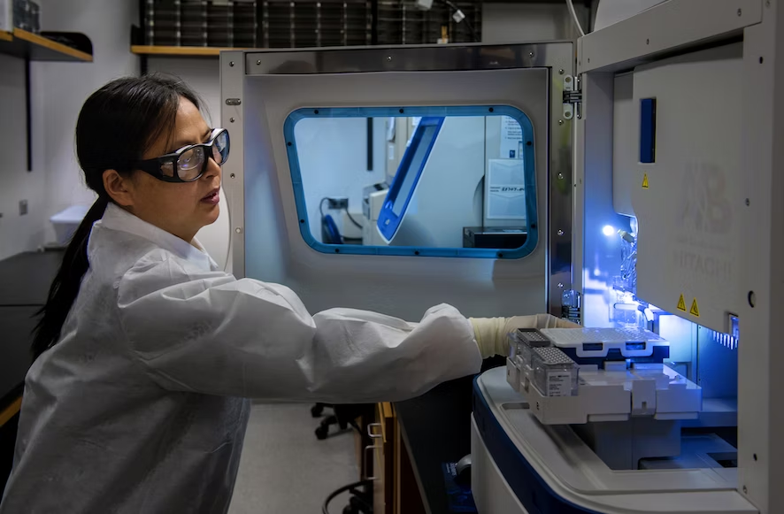 Scientist working in a lab testing area