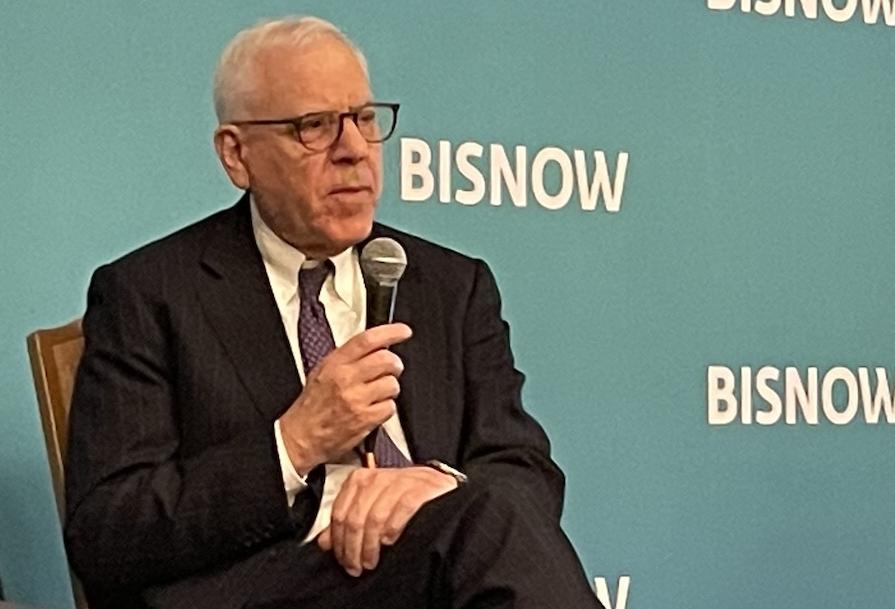 David Rubenstein speaking at a Bisnow event in D.C. in June 2023. 