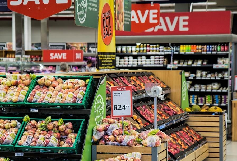 inflation cooling grocery store save sign