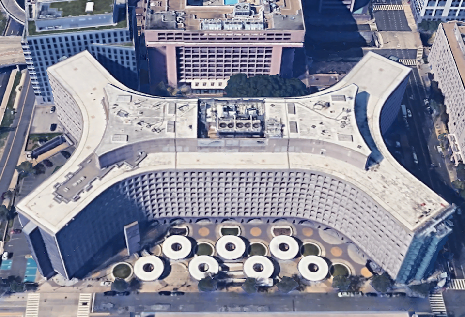 An aerial view of HUD's Weaver Building shows its four wings that real estate experts say made it a candidate for residential conversion.