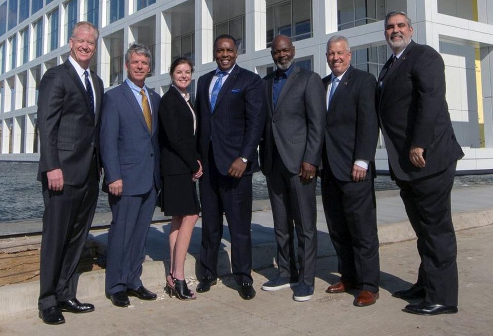 One Legacy West (L-R): Steve Jarvie (president, E Smith Realty), John McCain (CEO, NTT DATA), Belinda Dabliz (vice president of leasing, Gaedeke), Plano Mayor Harry LaRosiliere, Emmitt Smith (chairman, E Smith Realty), Glenn Lickstein (president, Gaedeke), David Croxville (CFO, NTT DATA)