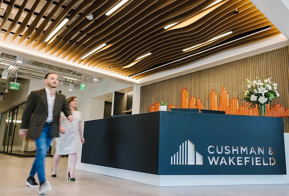 Cushman & Wakefield Revenue Climbs As AI Leases Drive Dealmaking