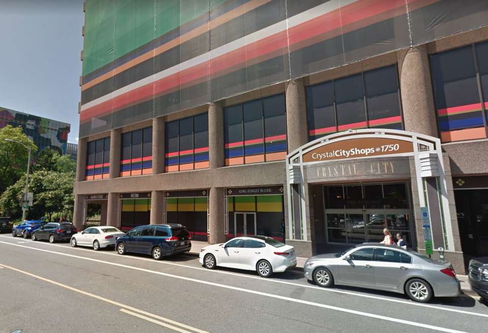 The entrance to the Crystal City Shops at 1750 Crystal Drive. Amazon has agreed to lease the building after it undergoes heavy renovations.