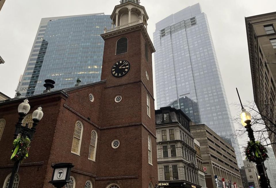 The streets of downtown Boston feature a mix of historic buildings and new developments.
