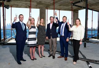 Sudhoff Cos. Jared Bonasera, Sudhoff Cos. Betty Harbourt, Pelican Builders Kerry Bollmann, Pelican Builders Derek Darnell, Sudhoff Cos. Kyle Mikulenka and Sudhoff Cos. Dina Gustin celebrate the topping off of The Revere at River Oaks, Houston. 