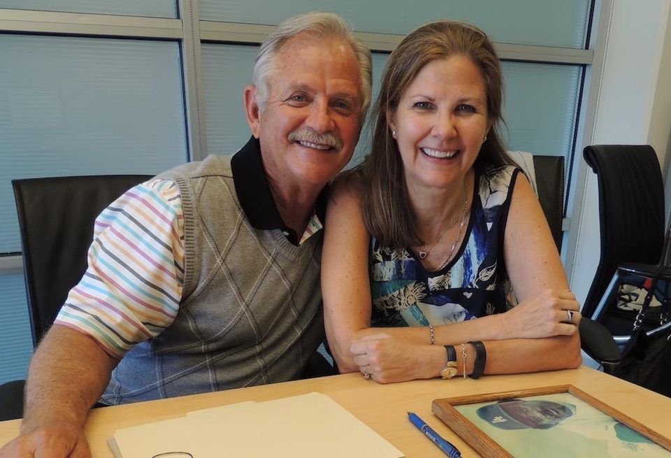 Janet Marie Smith sits with former Major League player and coach Rick Dempsey, who played for the Orioles and Dodgers during his career.