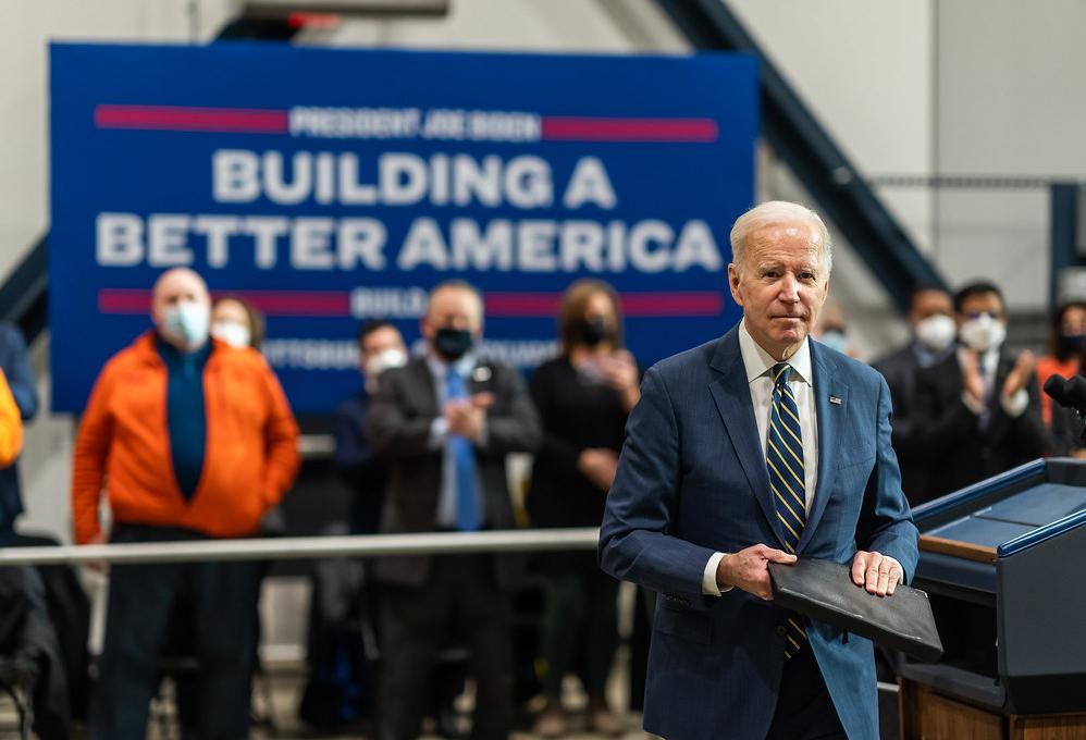 Biden walking away from a podium with a 