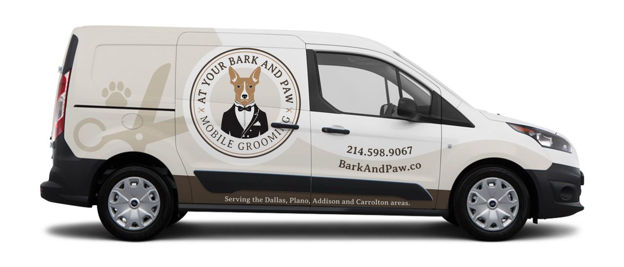 White van with dog grooming advertisement, featuring a logo of a dog in a tuxedo. Contact info and service areas listed on the side.