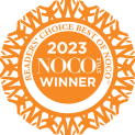 Orange and white badge reading "Readers' Choice Best of NOCO 2023 Winner" with a circular decorative pattern.