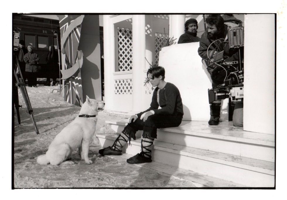 Black and white photo with dog and trainer