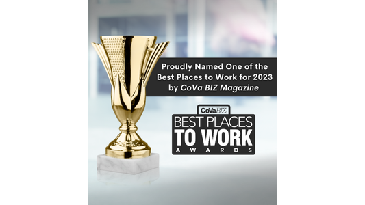 A golden trophy next to a sign reading "Proudly Named One of the Best Places to Work for 2023 by CoVa BIZ Magazine."