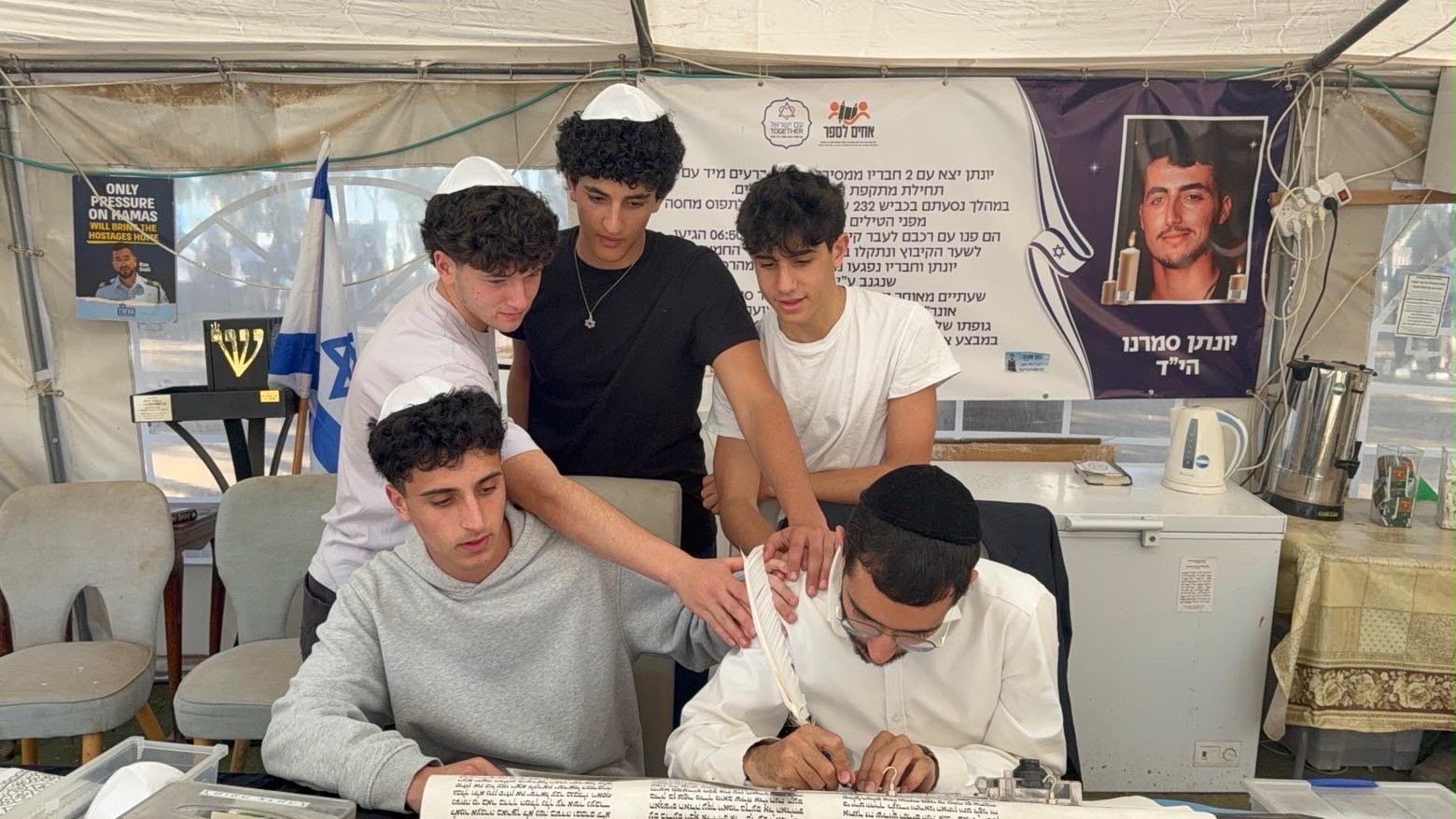 Adam and Muss students participating in Jewish National Fund-USA's "Be Inscribed" program at the Nova Festival memorial