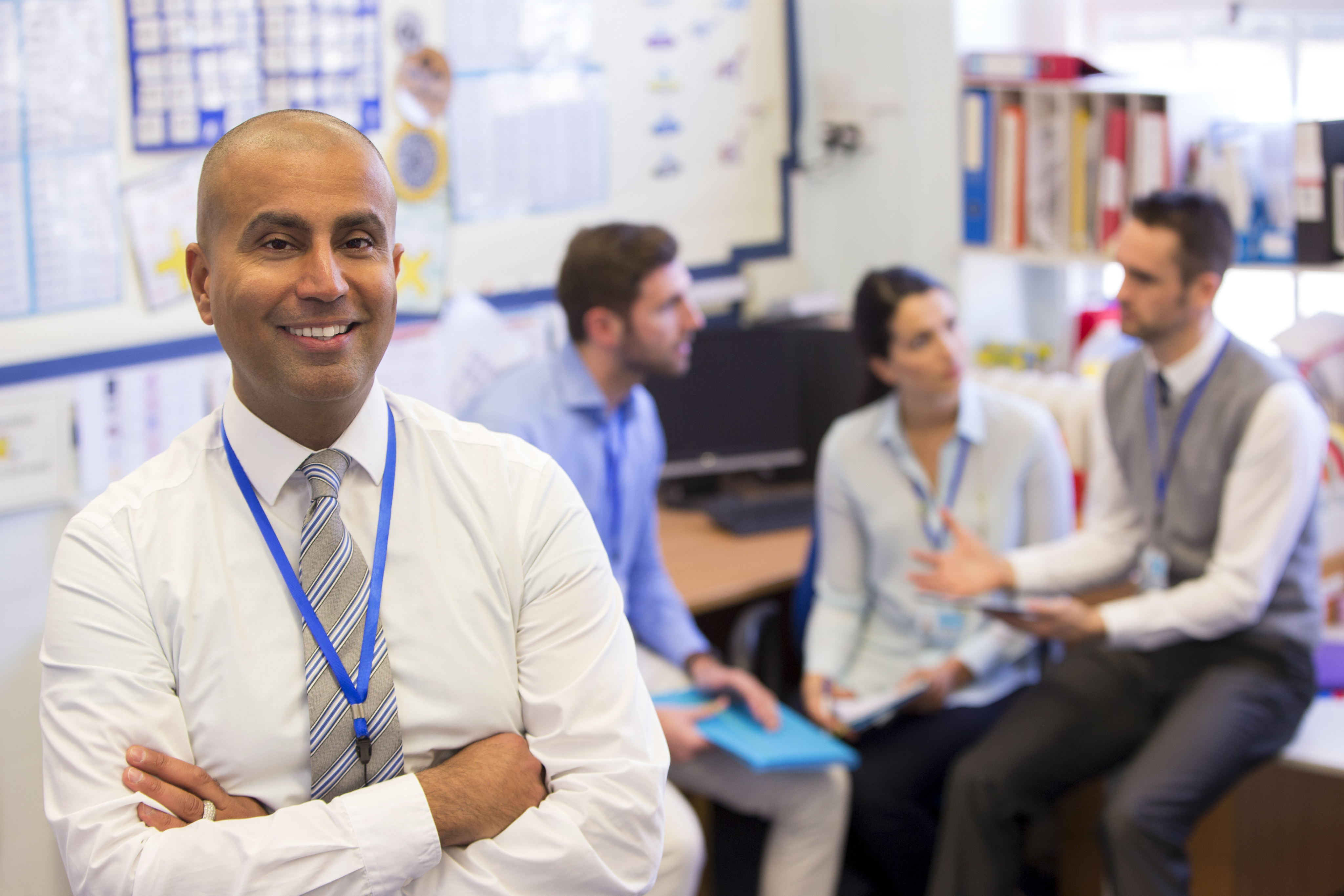 Education partner staff meeting at a school