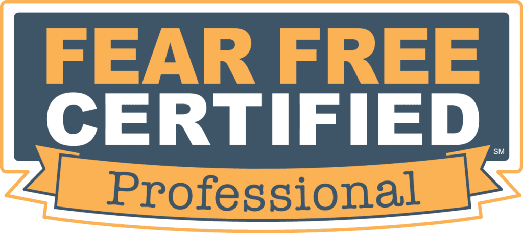 FEAR FREE" Logo in orange and "CERTIFIED" in white on a dark blue rectangular background, positioned above an orange ribbon that reads "Professional" in dark blue text